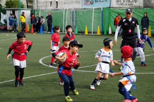 Ninja class player running with a ball in hand.